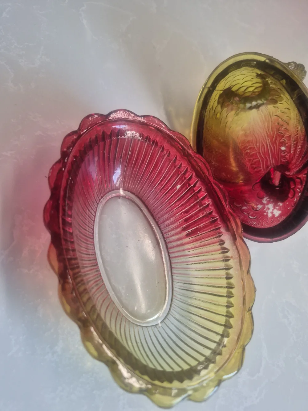 Hen On Basket. Carnival Glass Decorative Dish in Amber to Ruby Iridescent